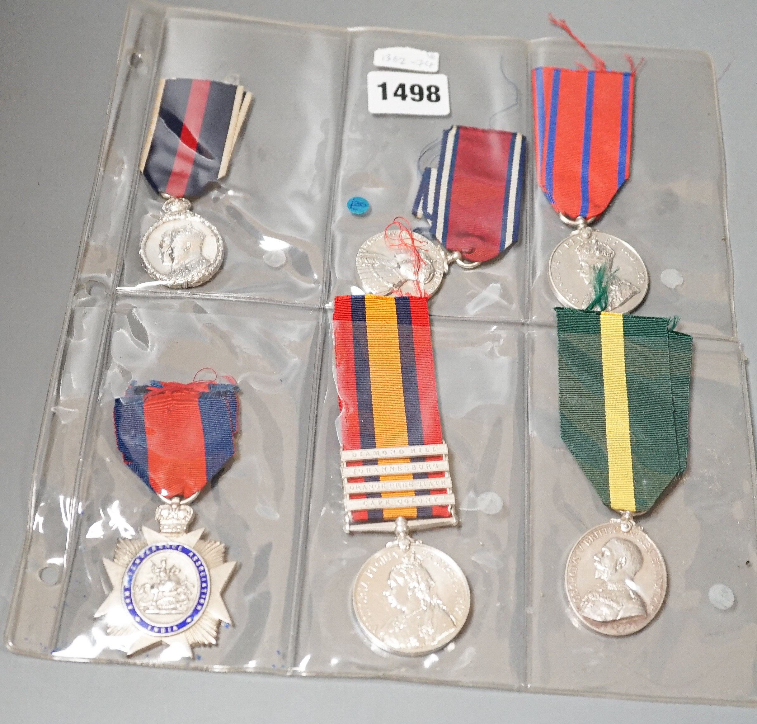 Six military associated medals to include - QSA with four clasps to 184 PTE. T. GRIFFITHS C.I.V., George V Territorial Force Efficiency Medal to 314 SJT. E.H. BARTON 25/ CYC.BN. LOND. REGT. (25th County of London Cyclist